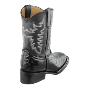 Vista cercana del talón botas vaqueras niño color negro